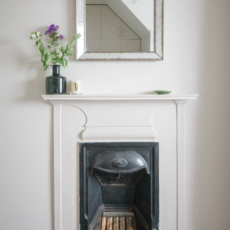 neutral bedroom fireplace