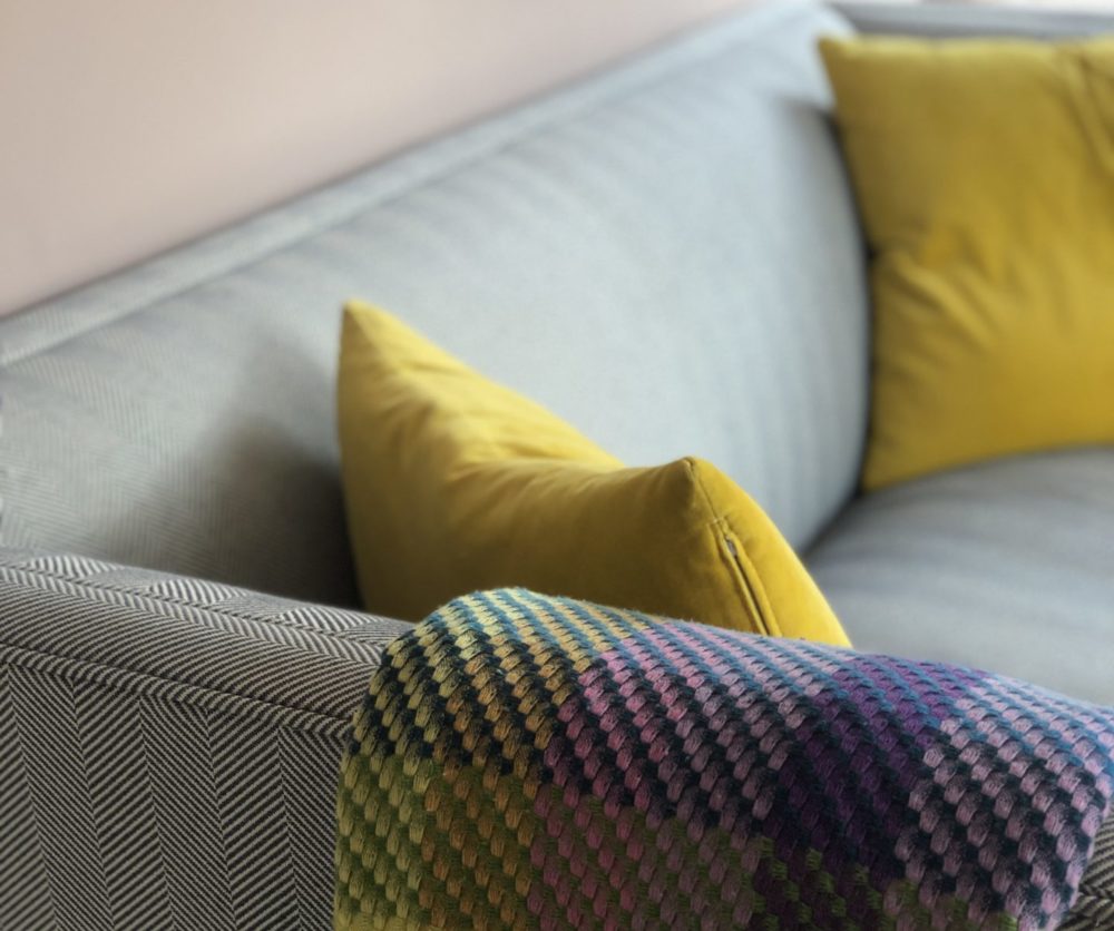 sofa and yellow cushions