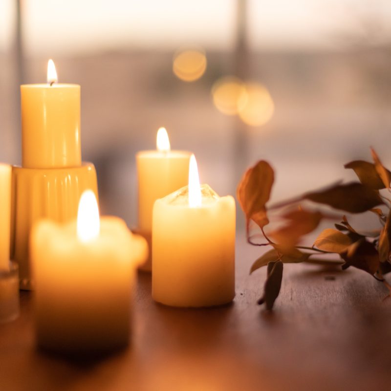 Candles on a brown table