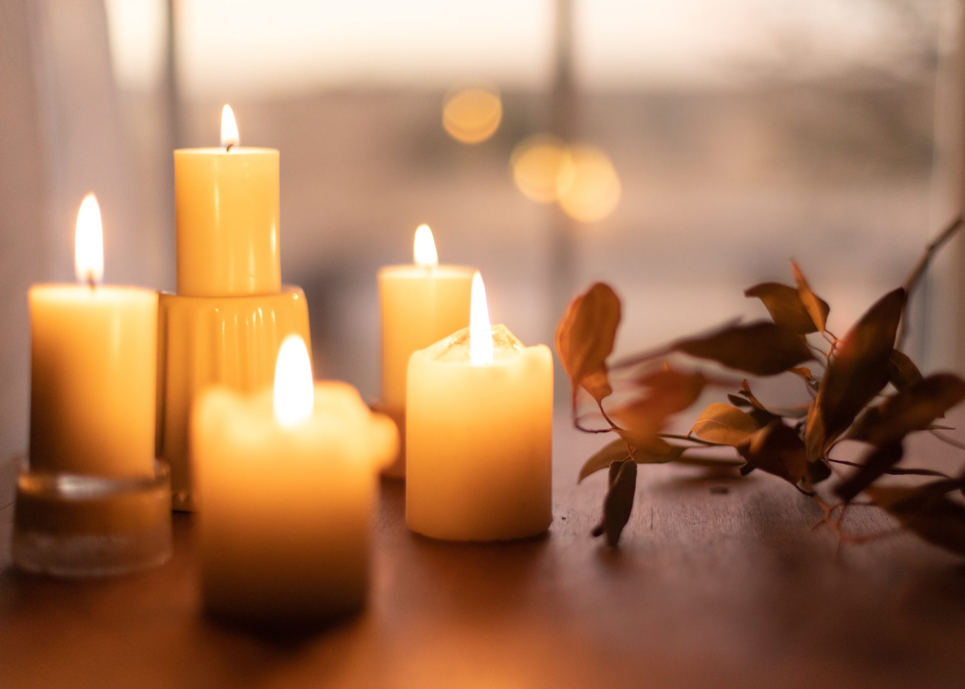 Candles on a brown table